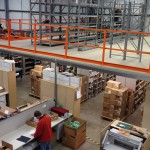 Mezzanine Floor with cantilevered beams oversailing legs