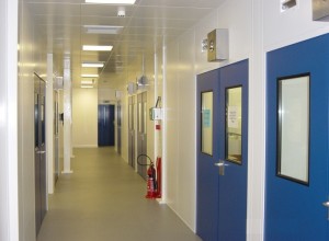 Cleanroom corridor with pressurized doors and steel pan ceiling