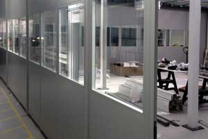 Part-glazed double skin steel partitioning